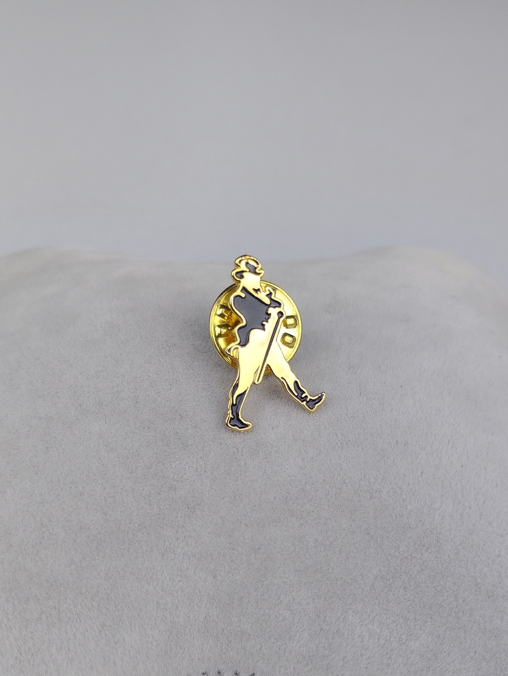 Johnnie Walker "Strinding Man " Gold Tone and Black Enamel Lapel Pin .